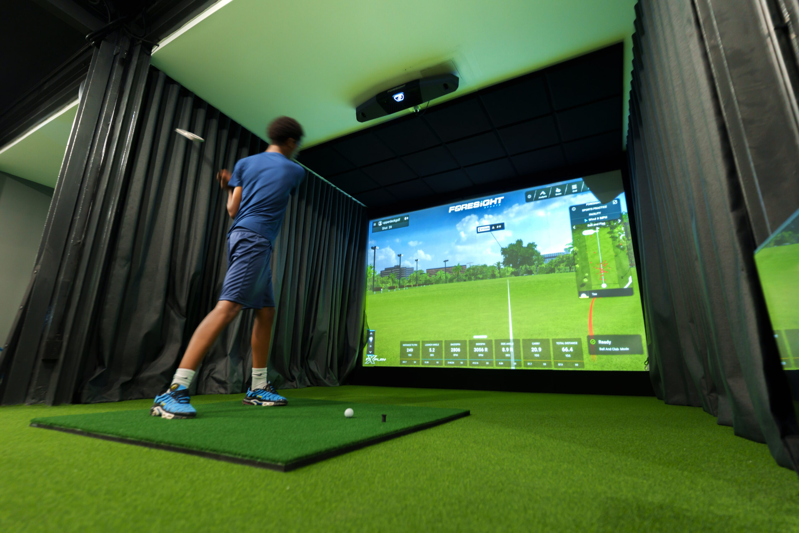 Golf bays by The Upper Deck Sports Bar